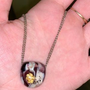 Purple marble stone with gold nug